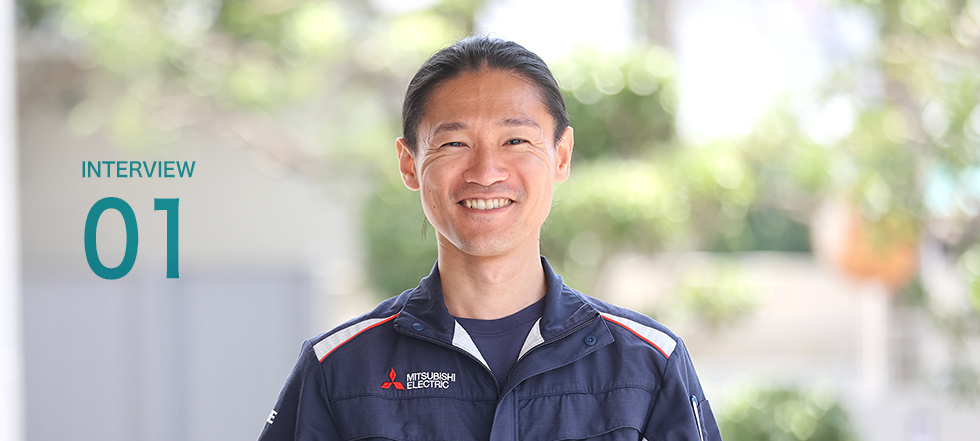 機械設計職の男性社員の笑顔の写真